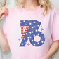 a woman wearing a pink shirt with the number seventy on it