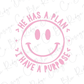 a pink smiley face with the text "He has a plan I have a purpose" written around it.
