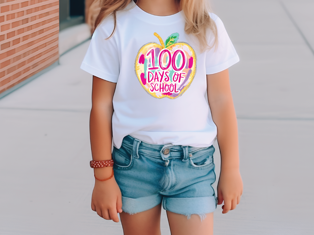 a little girl wearing a 100 days of school shirt