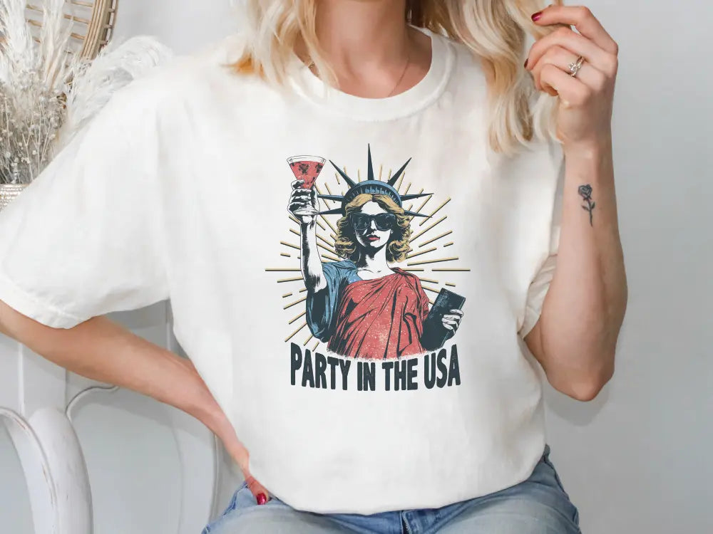 a woman wearing a t - shirt that says party in the usa