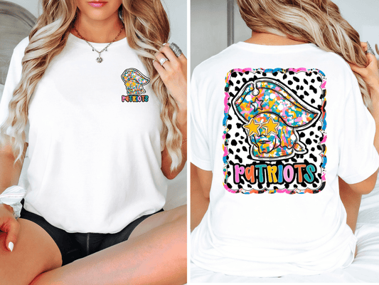 The image is a collage of two photos. In the first photo, a woman is wearing a white t-shirt with a colorful graphic and text on the back. In the second photo, the woman is sitting on a bed, and the back of her white t-shirt is visible, featuring a colorful graphic and text.