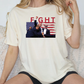 a woman sitting on a couch wearing a t - shirt with a picture of two