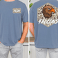a man wearing a blue t-shirt with a graphic of an eagle and the word "FALCONS" printed on it.