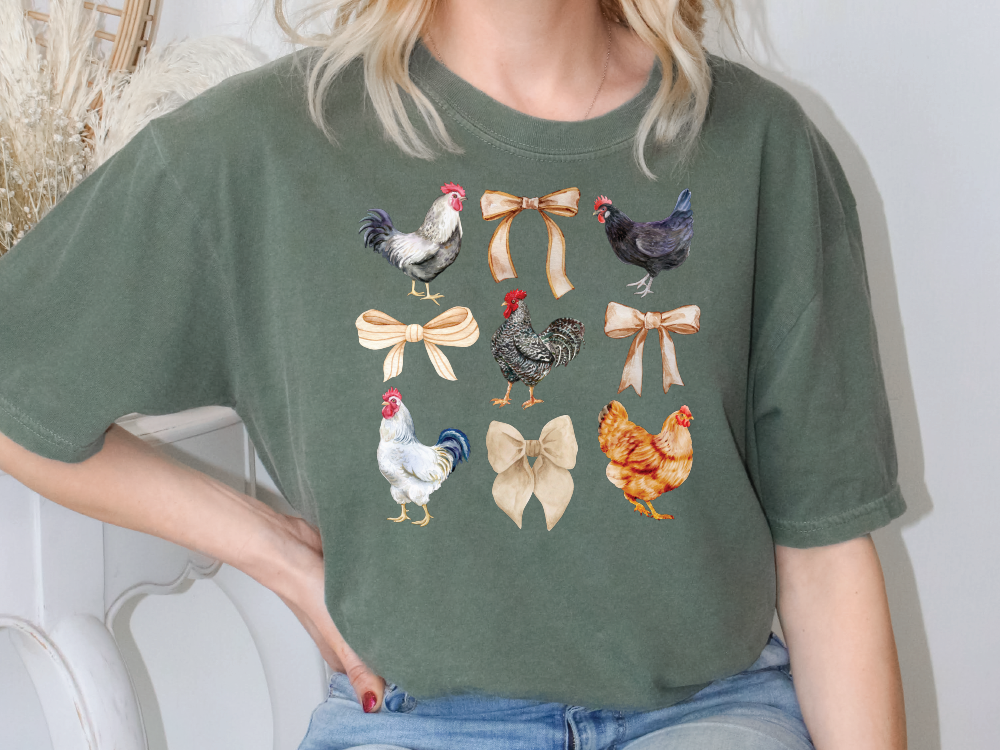 a woman wearing a green shirt with chickens on it