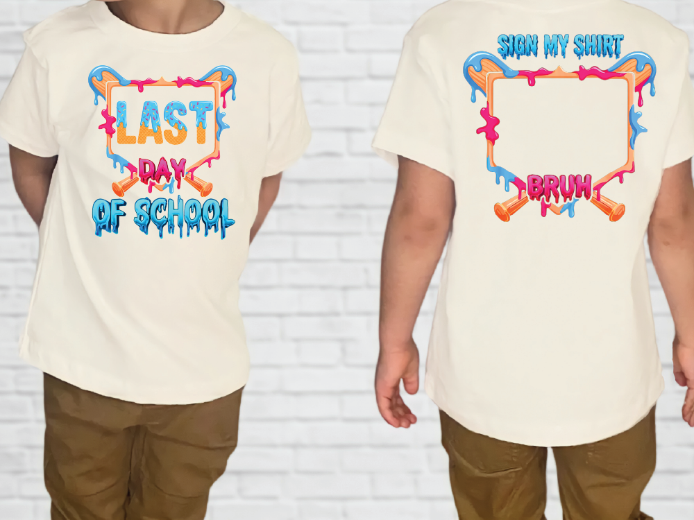 a white t-shirt with a colorful graphic design on the back. The design includes a sign that says "LAST DAY OF SCHOOL" and a graphic of a bat. The design is colorful and vibrant, with the bat and sign being the main elements.
