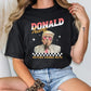 a woman wearing a donald trump t - shirt