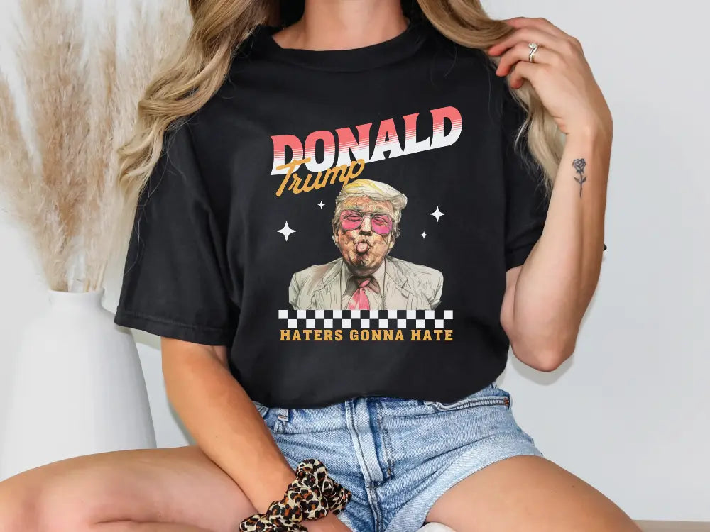 a woman wearing a donald trump t - shirt