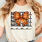 A woman wearing a white t-shirt with a basketball graphic and the word "mama" written below it.