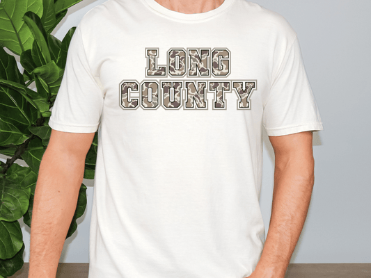 A person wearing a white t-shirt with the text "LONG COUNTY" printed on it.