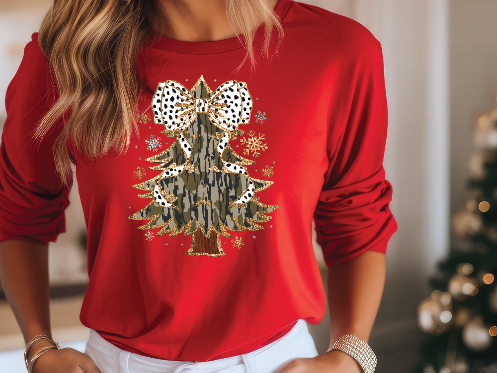 a woman wearing a red shirt with a christmas tree on it