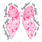 a pink ribbon with a pink ribbon on it