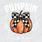 a pumpkin with a checkered bow on it