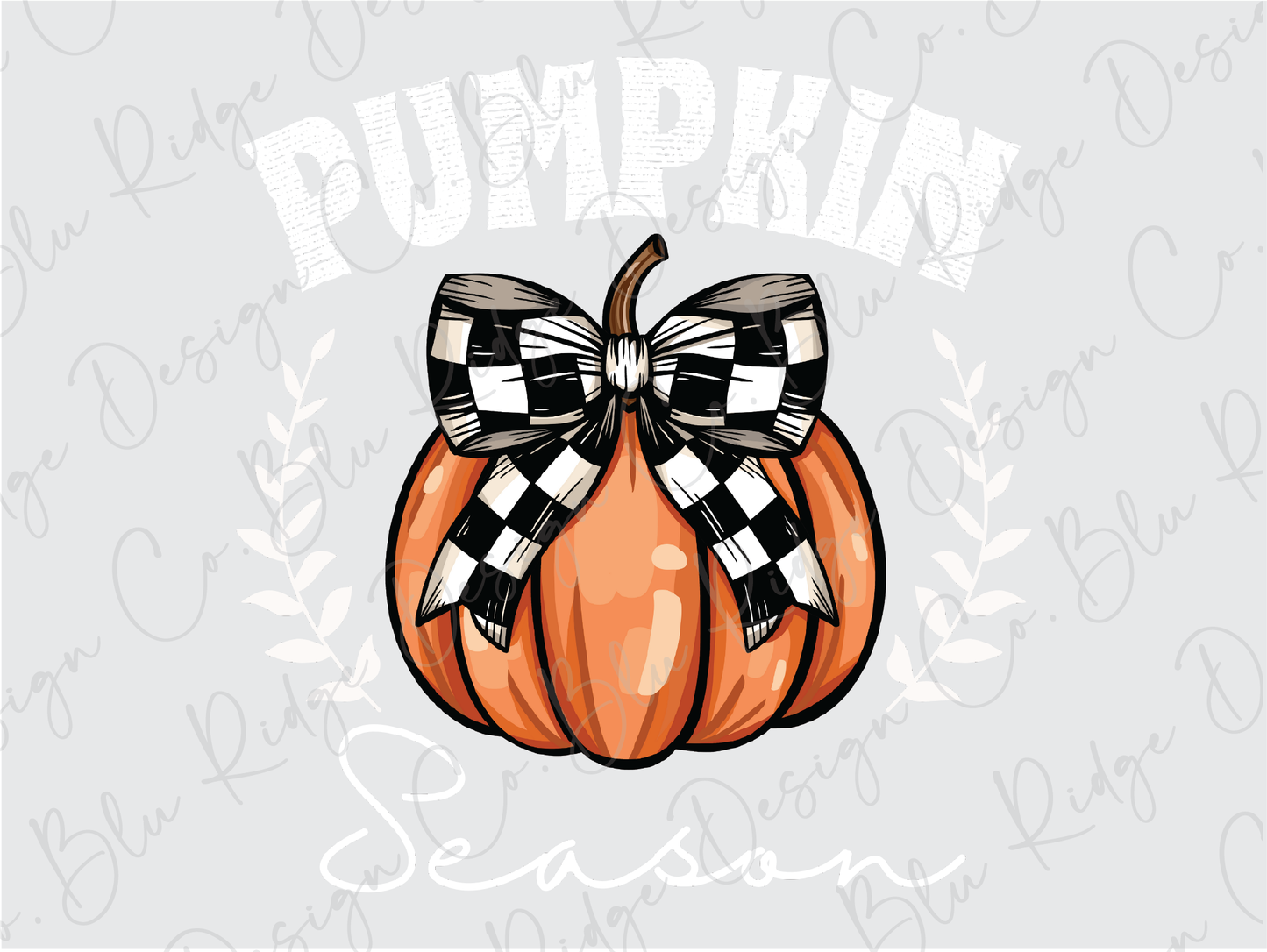 a pumpkin with a checkered bow on it