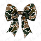 A camouflage-patterned bow made of fabric or paper.