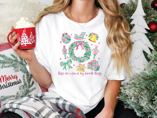 a woman holding a cup of hot chocolate in front of a christmas tree