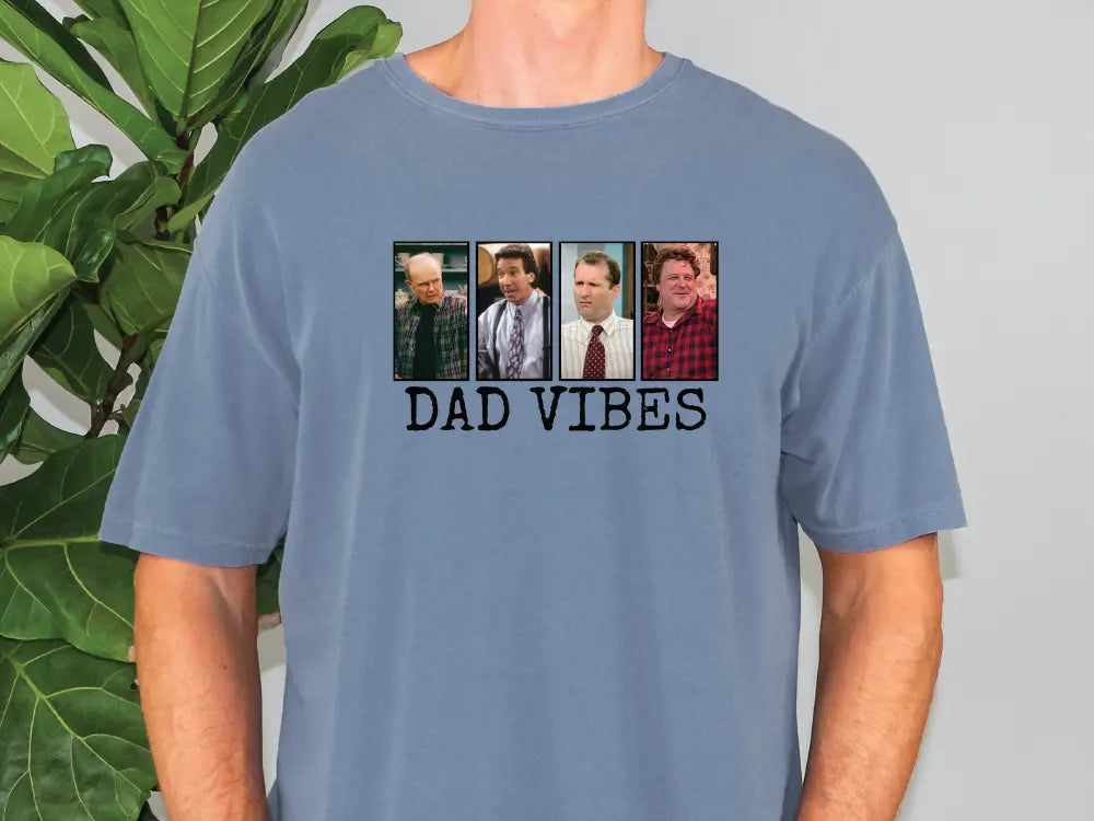 a man wearing a t - shirt that says dad vibes