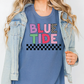 a woman wearing a blue t - shirt that says blue tide