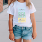 a little girl wearing a t - shirt that says eat, drink, and dance