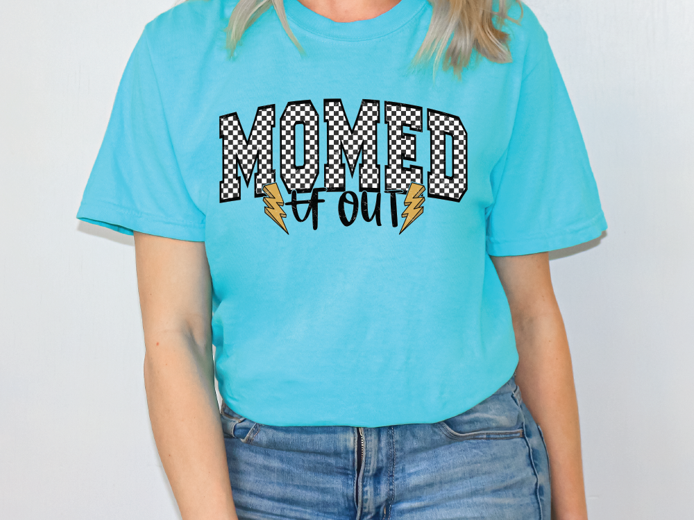 a woman wearing a blue t - shirt with the word married on it