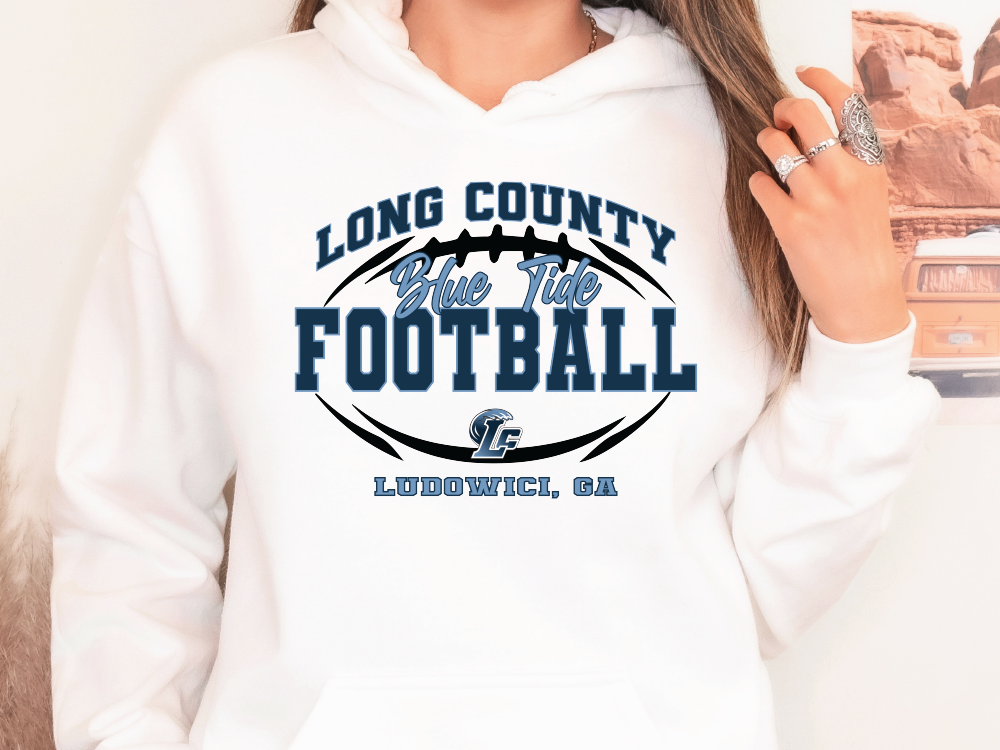 a woman wearing a white hoodie with a football on it