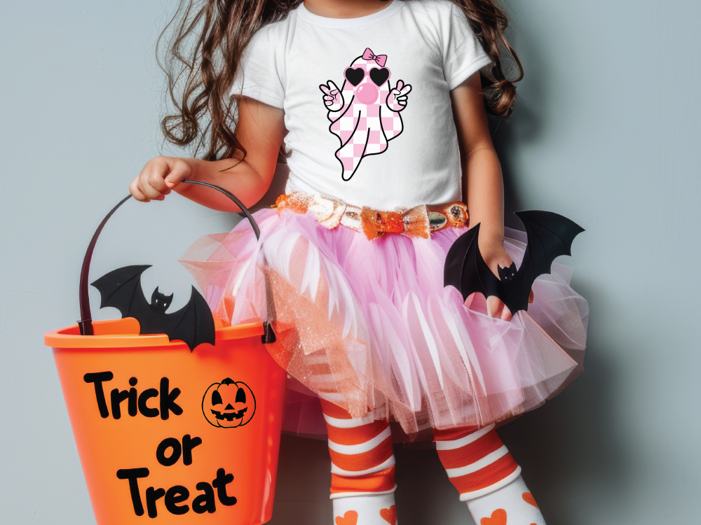 a little girl in a trick or treat costume holding a trick or treat bucket