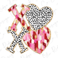 a pink and black heart with a cross on it