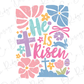 a cross and flowers with the words he is risen