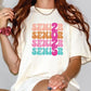 a woman with long red hair wearing a t - shirt