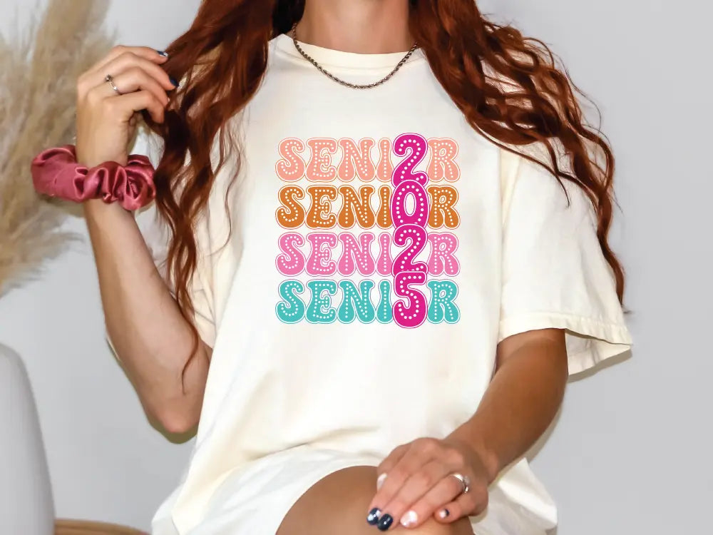 a woman with long red hair wearing a t - shirt