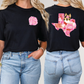 a pair of women wearing black texas shirts