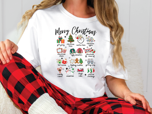 a woman sitting on a chair wearing a white t - shirt that says merry christmas