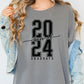 a woman wearing a gray t - shirt with the number twenty twenty twenty twenty twenty