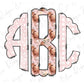 the letter b is made up of pink and white polka dots