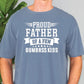 a man wearing a t - shirt that says proud father of a few dumbers