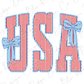 the word "USA" with red and white striped patterns and blue polka dots, along with two blue bows on either side of the letters.
