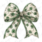 a green and white bow with shamrocks on it