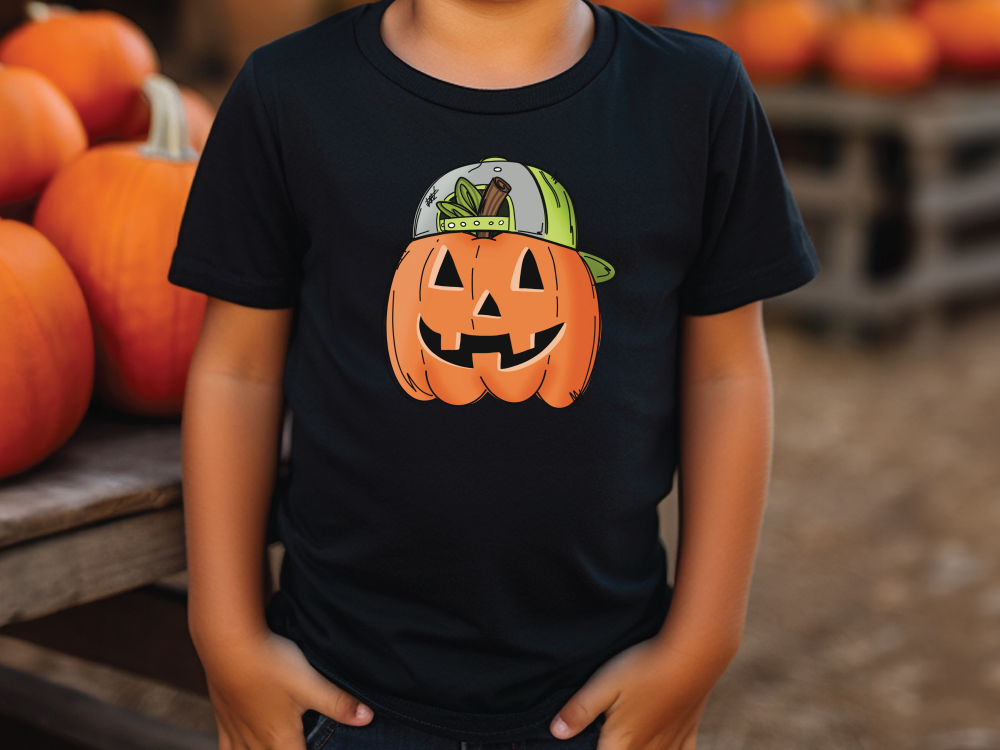 a young boy standing next to a pile of pumpkins