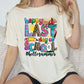 a woman sitting on a couch wearing a t - shirt that says happy last school