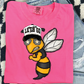 A pink t-shirt with a cartoon bee wearing a baseball cap and sunglasses, along with the text "LET'S GO" printed on it.