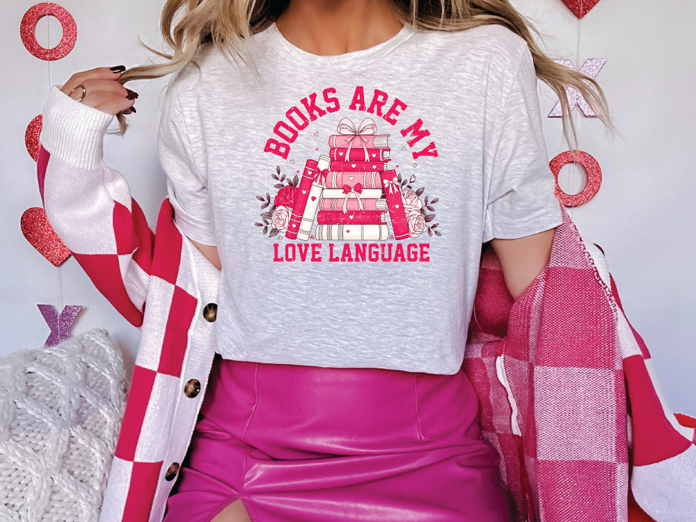 a woman wearing a t - shirt that says books are my love language