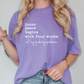 a woman wearing a purple shirt that says inner peace begins with four words