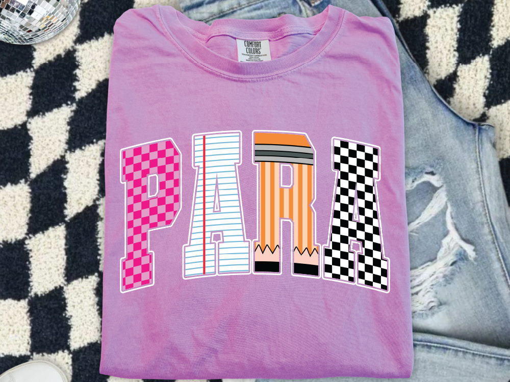 A pink t-shirt with the word "PARA" printed on it, along with various colorful and stylized lettering designs.