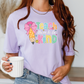 a woman holding a coffee cup and wearing a t - shirt that says teach them