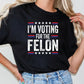 a woman wearing a t - shirt that says i'm voting for the fe