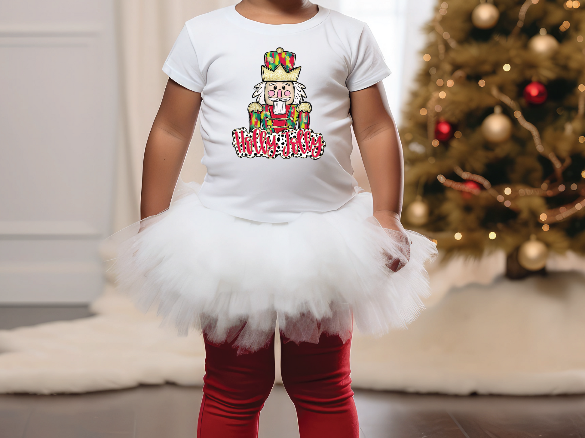 a little girl standing in front of a christmas tree