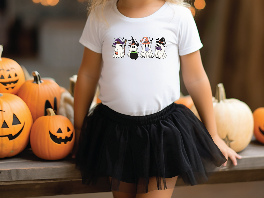 a little girl wearing a white shirt and black skirt