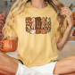 a woman sitting on a bed holding a coffee mug