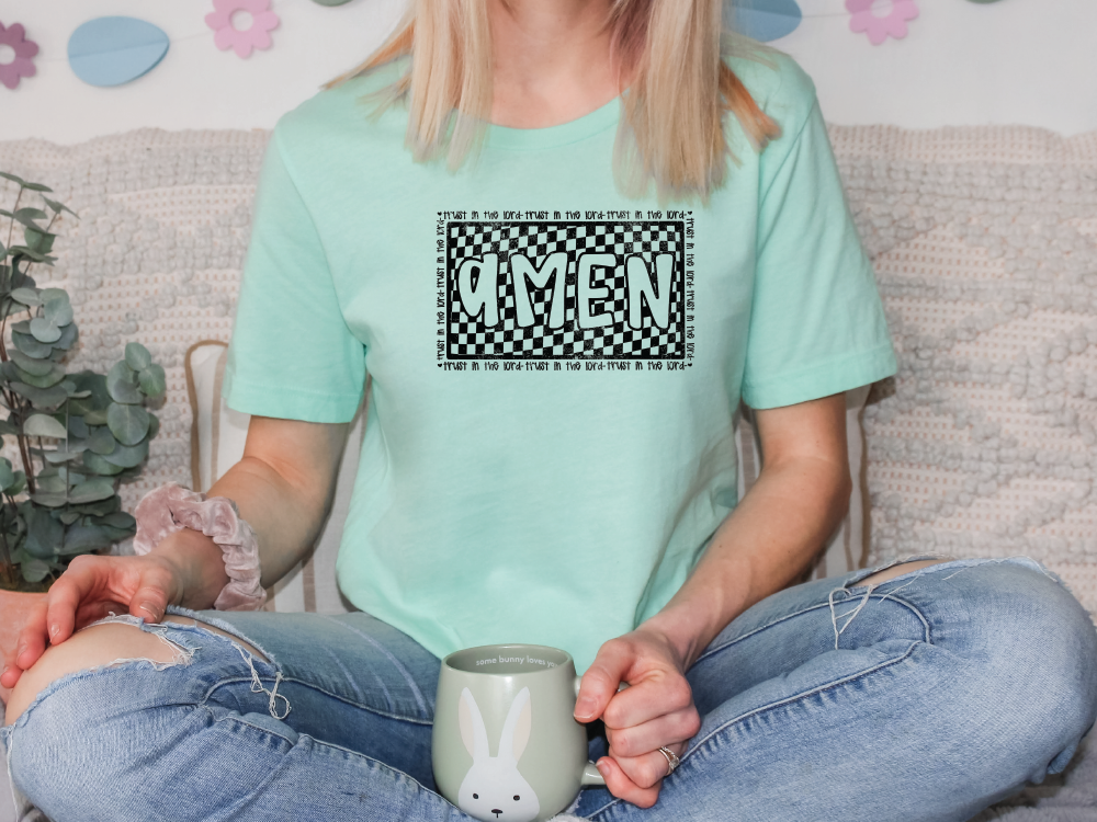 a woman sitting on a couch holding a coffee mug