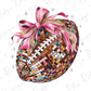 a painting of a football with a pink bow