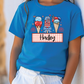 a little girl wearing a blue shirt with ice cream cones on it